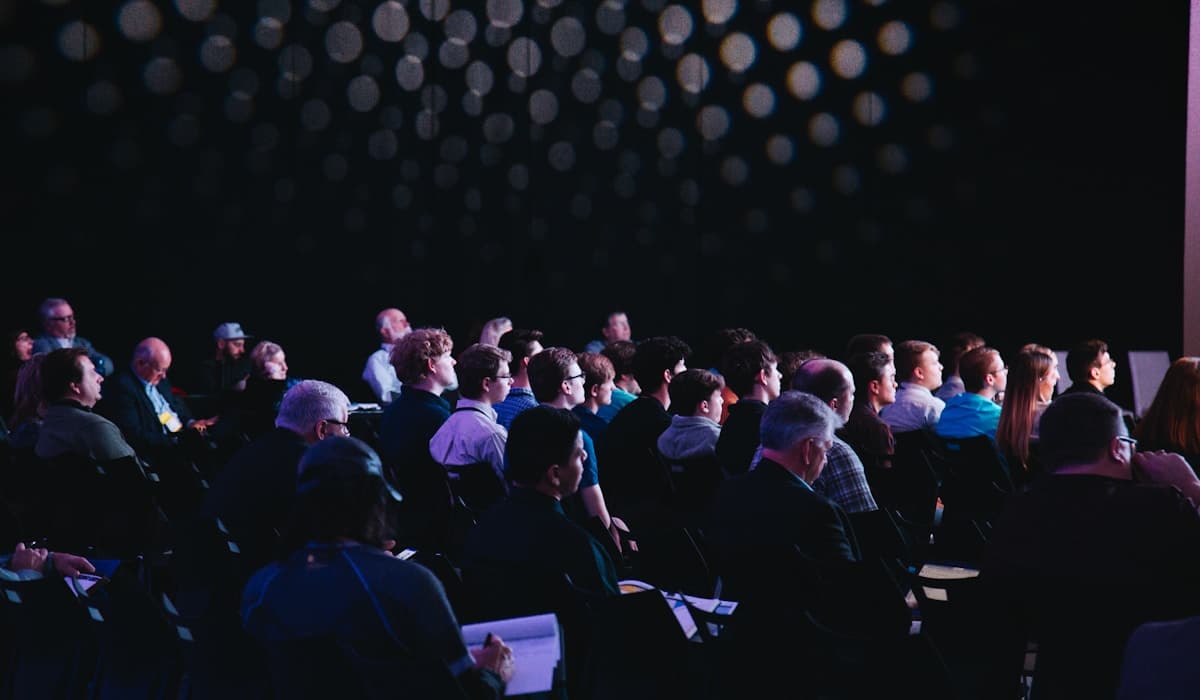 Business professionals collaborating at a corporate event