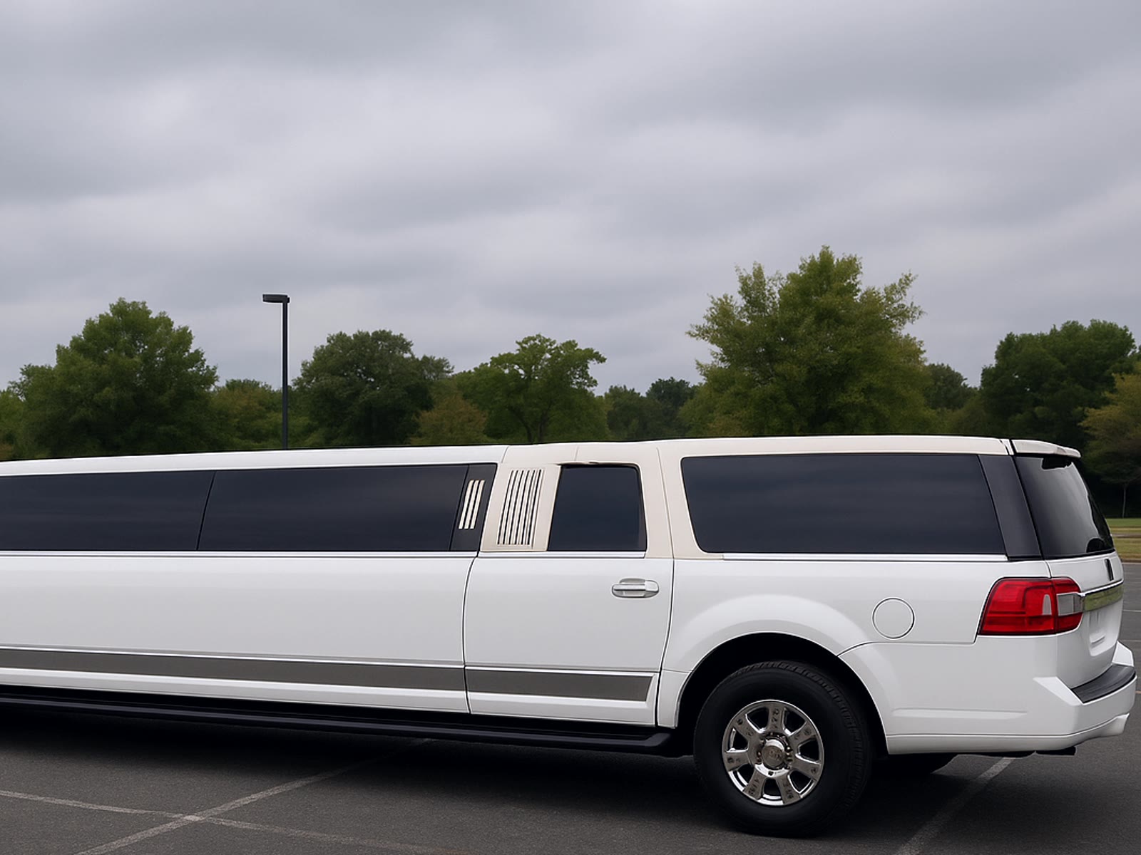 Stretch limousine exterior crop contrasting party-bus capacity